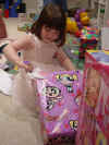 Katie opens a present.jpg (50848 bytes)