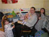 Paul reads to Katie & Jenny.jpg (84431 bytes)